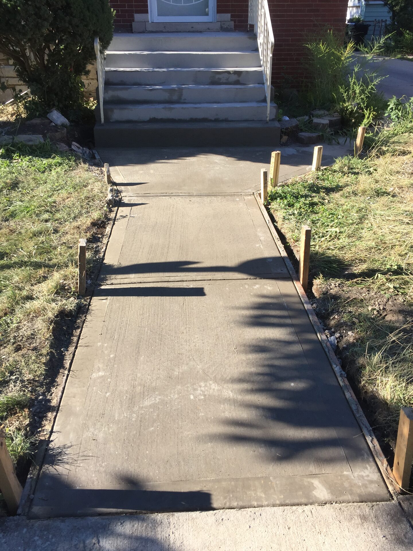 Freshly poured concrete sidewalk and walkway