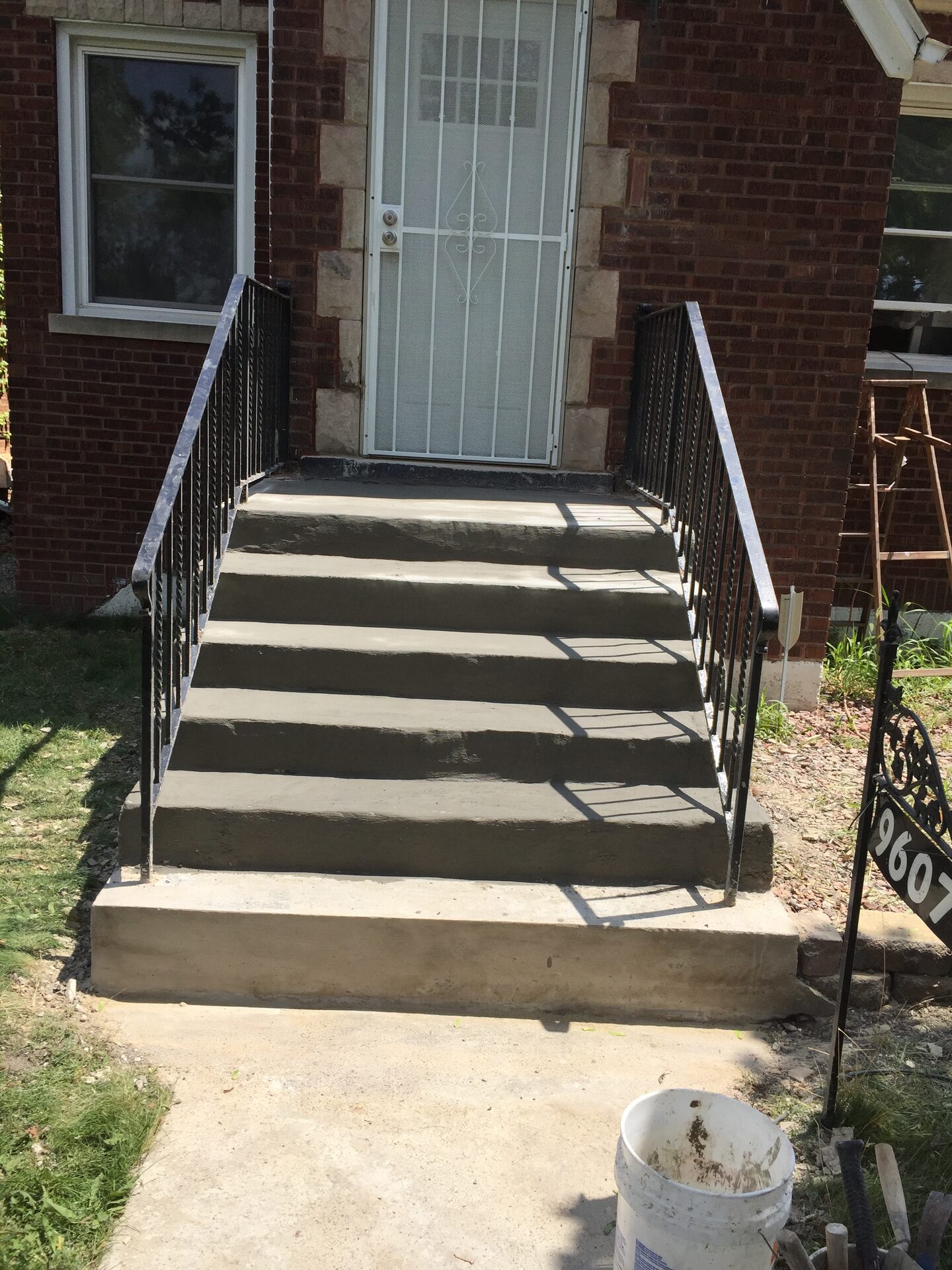 New concrete steps and front entry